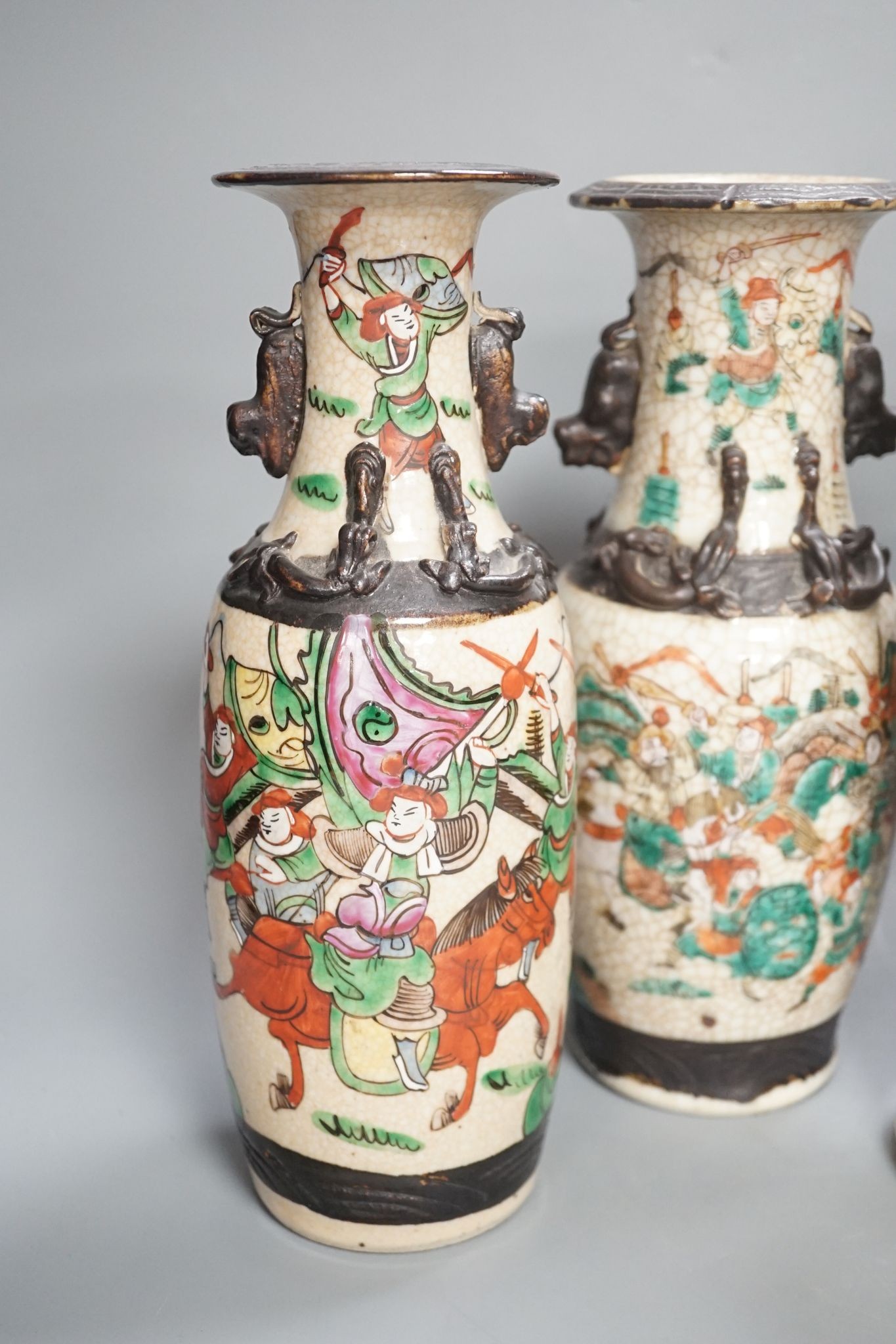 A pair of Chinese crackle glaze vases, a similar vase and cover, and another, late 19th/early 20th century (4), tallest 29 cms high.